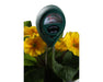 Active Air 2-Way Moisture and pH Meter inserted in soil among yellow flowers for real-time testing.