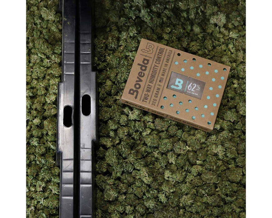 Boveda 62% RH 320g pack placed on harvested buds to restore moisture and maintain ideal humidity.