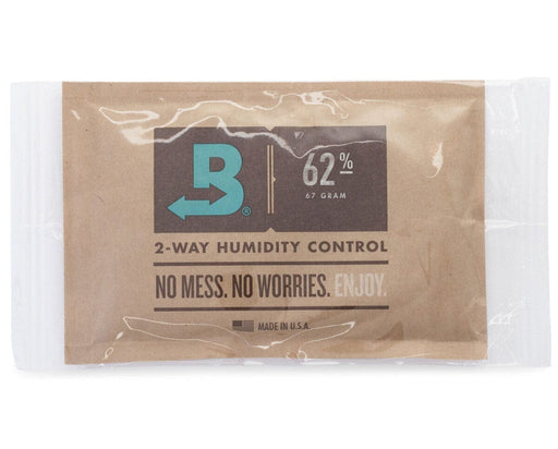 Front view of a sealed Boveda 62% humidity control pack in clear plastic, featuring kraft paper packaging labeled with 2-way humidity control and 67 grams.