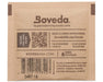 Back side of a Boveda 62% RH humidity control pack displaying instructions, barcode, QR code, and website details for usage guidance, labeled "The global leader in 2-way humidity control.