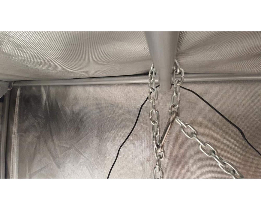 A metal carabiner and chain connect the DriFlower hanger system to the interior ceiling bars of a grow tent, demonstrating secure installation.