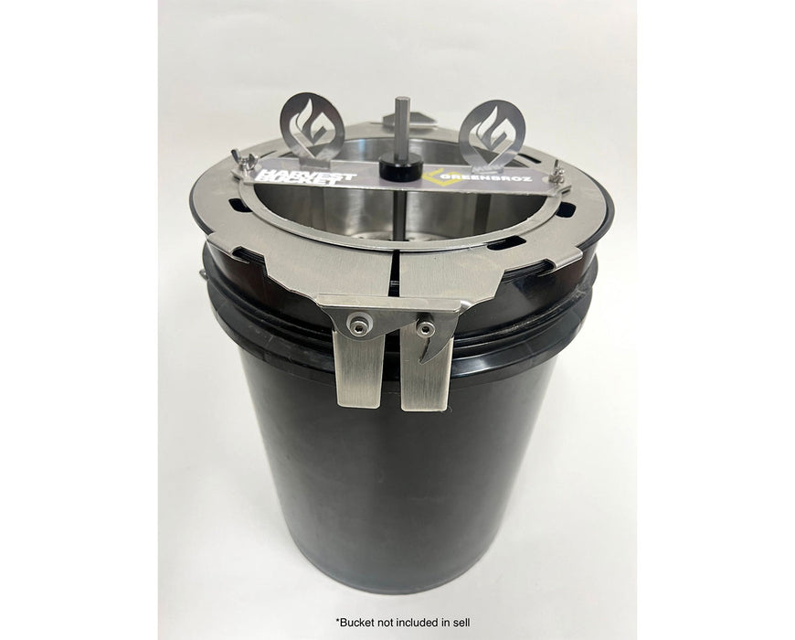 GreenBroz Harvest Bucket Trimmer securely attached to a black bucket, ready for trimming operation.