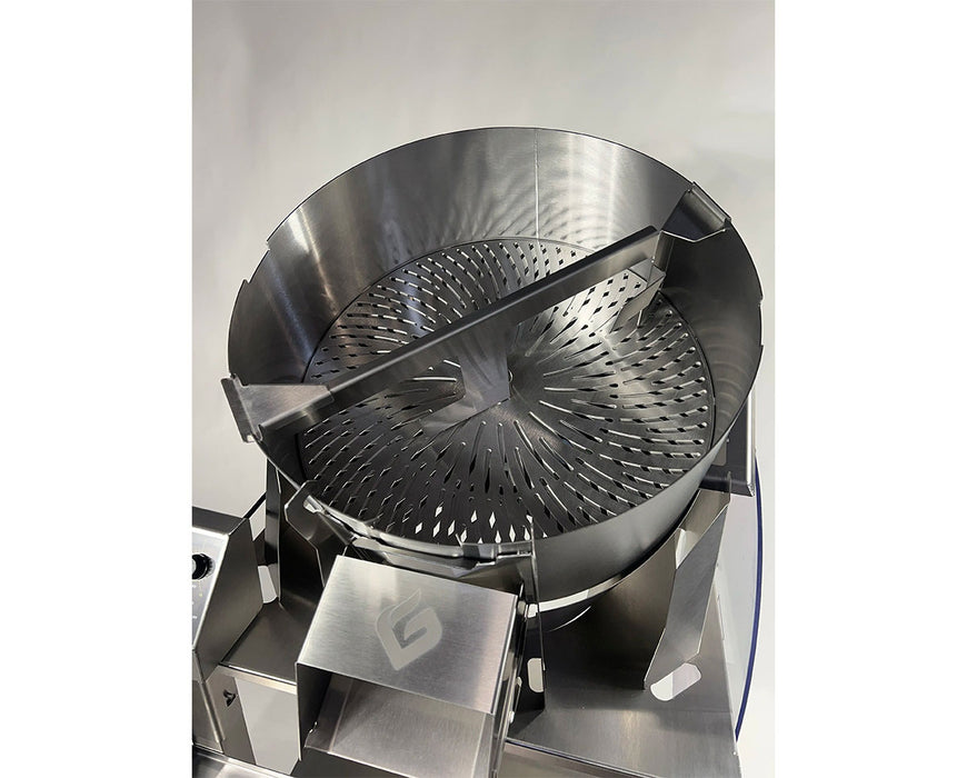 Top view of GreenBroz M1 trimming chamber highlighting the precision-cut trimming disc and blade wiper assembly.