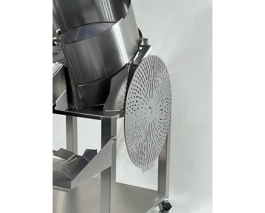 Close-up of removable trimming blade disc mounted on the side of the GreenBroz M1 Dry Trimmer for easy access and cleaning.