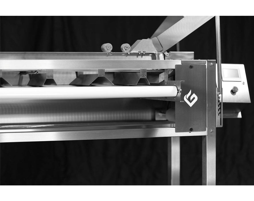 Angled view of GreenBroz Precision Bud Sorter in action with cannabis buds moving along the sorting conveyor.