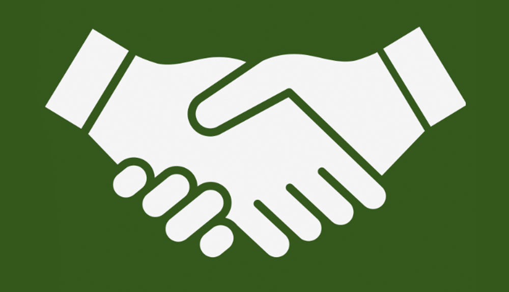 White handshake icon on green background.