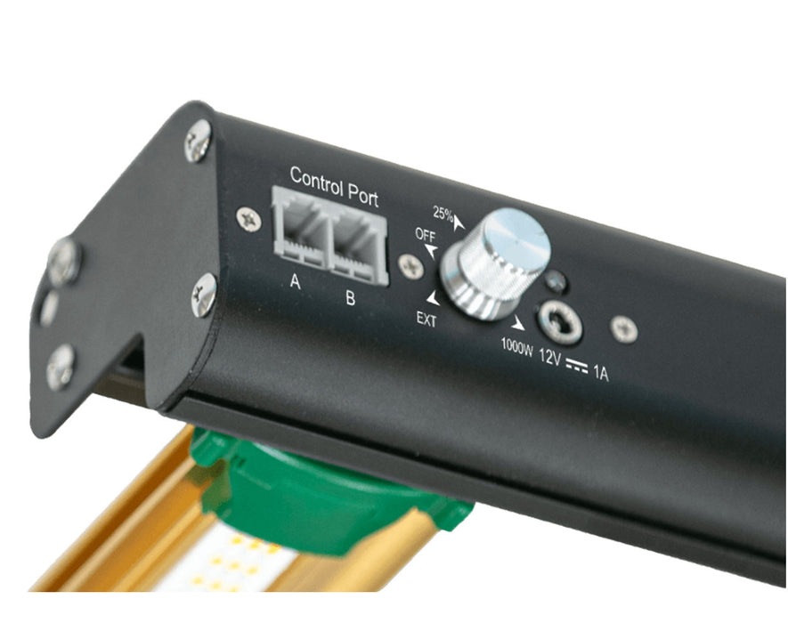 Control panel of ROI-E900 LED Grow Light showing dimmer knob, control ports, and 1000W label.