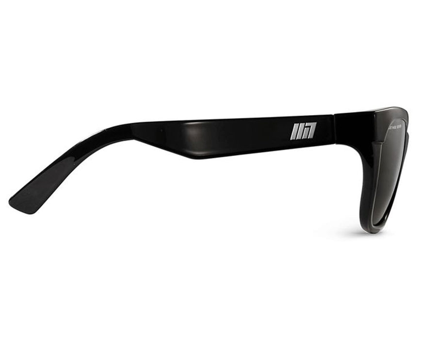 Side profile of Method Seven Coup Sun Polarized sunglasses featuring a sleek black arm with logo detail.