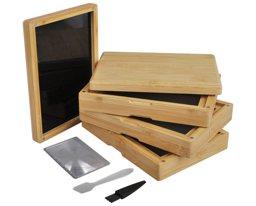 Stacked Rosineer bamboo pollen sifters with micron screens, magnifier, scraper, and cleaning brush included.