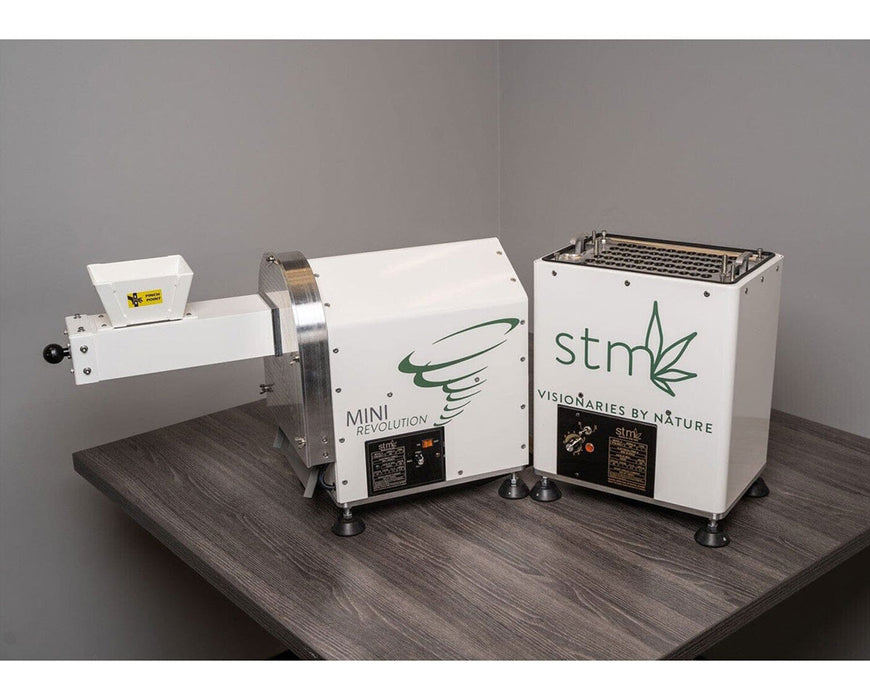 STM Mini Revolution and STM MFX Grinder setup on tabletop for pre-roll production.