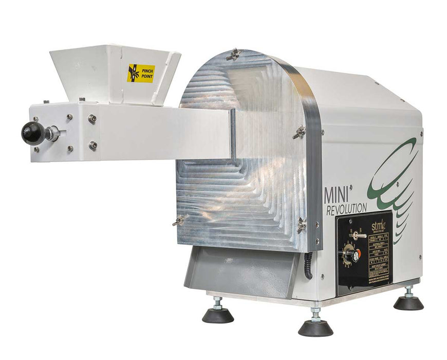 Angled rear view highlighting the curved aluminum grinding chamber and intake chute.