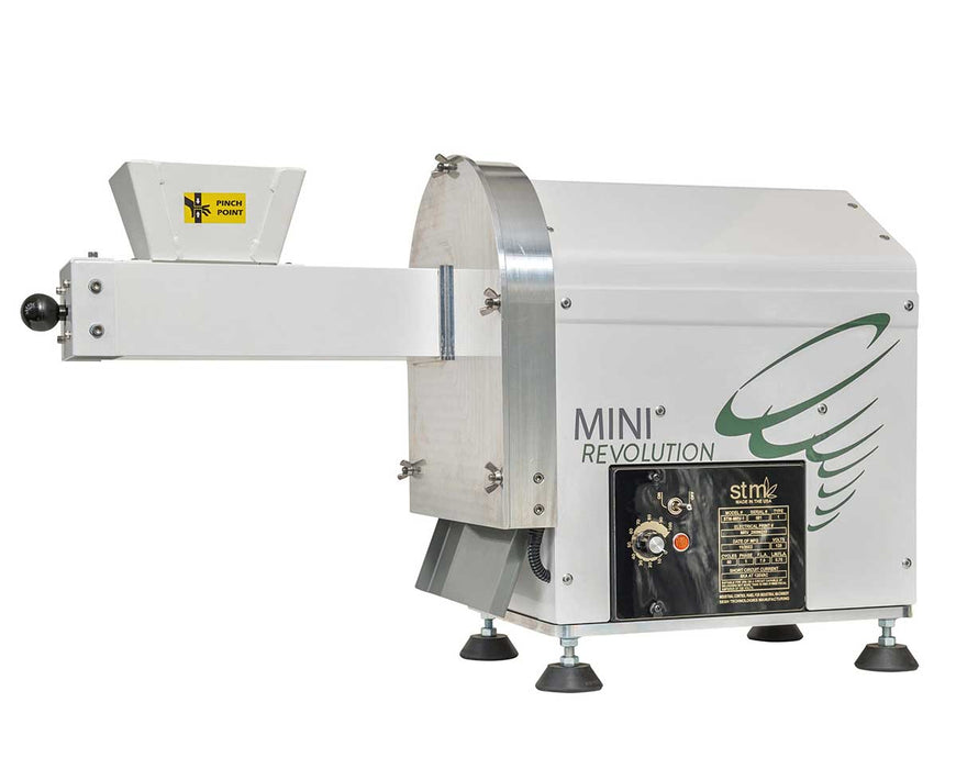 Left side profile of STM Canna Mini Revolution Grinder showing funnel, chute, and control dial.