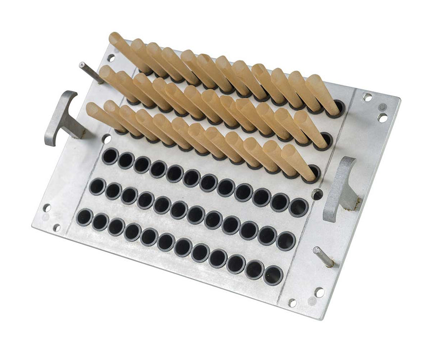 Filled pre-roll cones positioned in STM Mini RocketBox tray with black rubber holders.