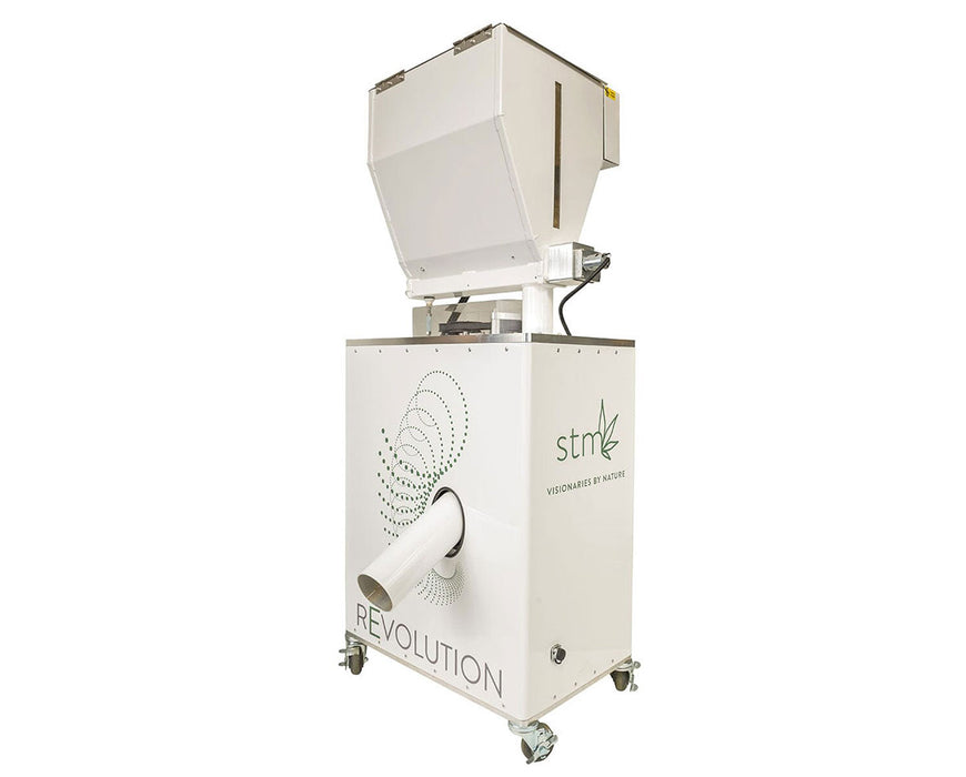 Industrial STM Revolution 2.0 grinder with top-loading hopper and front chute for high-capacity bud processing.