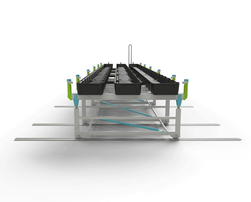 Front view of the track bench showing dual rows of trays and color-coded irrigation locks on vertical frame.
