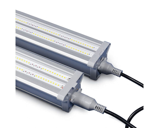 Close-up of Craft Farmer V3 under canopy lights with connected power cables and durable aluminum end caps.