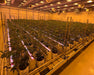 High-efficiency Craft Farmer V3 Undercanopy Lights installed in large grow facility with optimized power use.