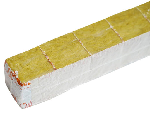 Close-up of individual Cultiwool Mini Clone Blocks, including a separated single cube and a full strip, featuring pre-drilled holes and labeled white wrap for easy transplanting.