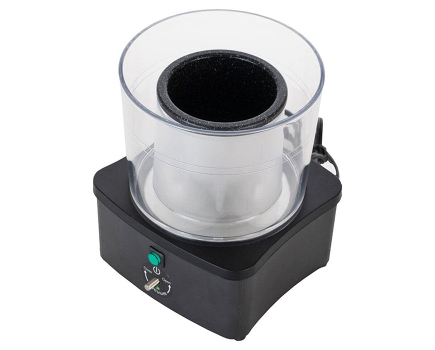 Element One countertop extractor showing stainless steel chamber and clear extraction vessel for home use.