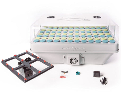 Fully assembled TurboKlone Elite 96 cloning machine with transparent humidity dome, 96 green and blue collars, and included pump, manifold, power adapter, and accessories shown in front.