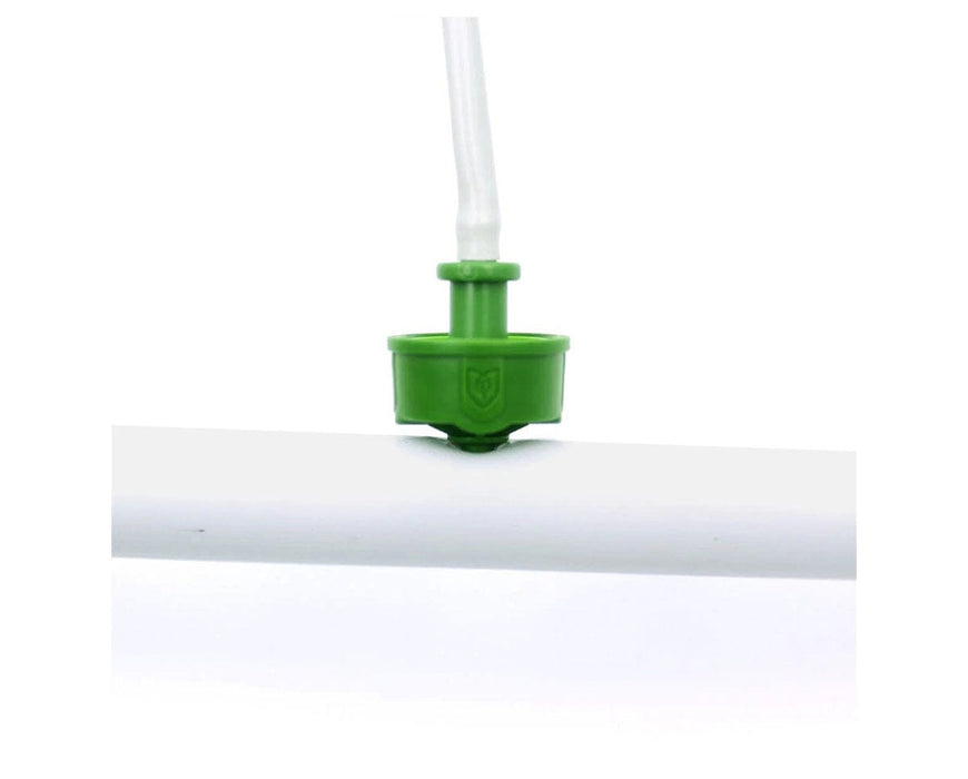 FloraFlex 1-Way GPH Assembly 0.5 GPH Connector Detail close-up showing secure FloraFlex micro tubing fit into green emitter housing.