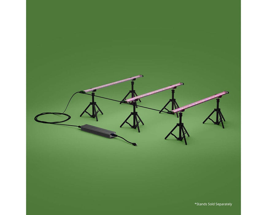 FloraFlex 360W 3-bar LED grow light system powered on with pink far-red glow, mounted on separate tripod stands.