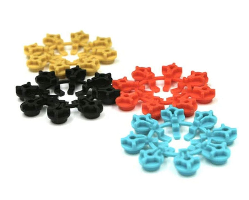 Mixed-color FloraFlex Bubbler Flow Inserts in yellow, black, red, and blue on white background.