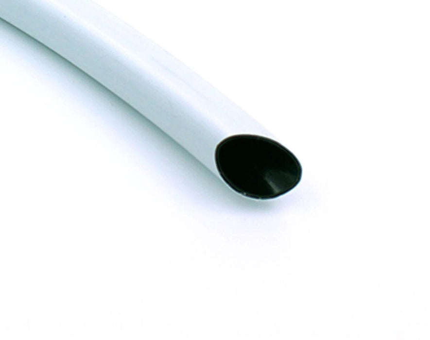 End view of cut FloraFlex double-layer tubing showing black inner core for algae prevention.