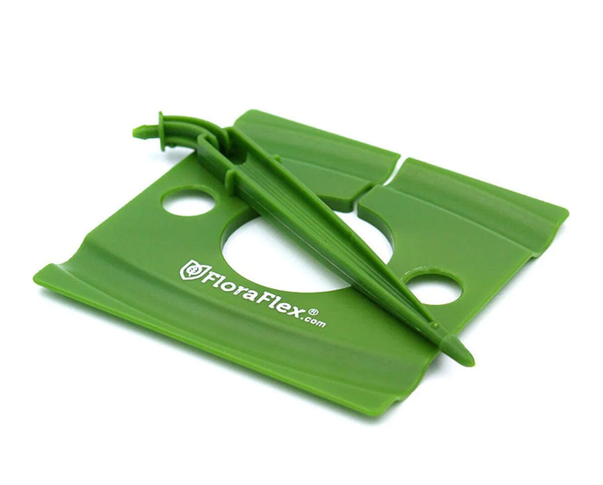 FloraFlex Drip Shield 2.0 with two FloraClips attached for precision irrigation connection and setup.