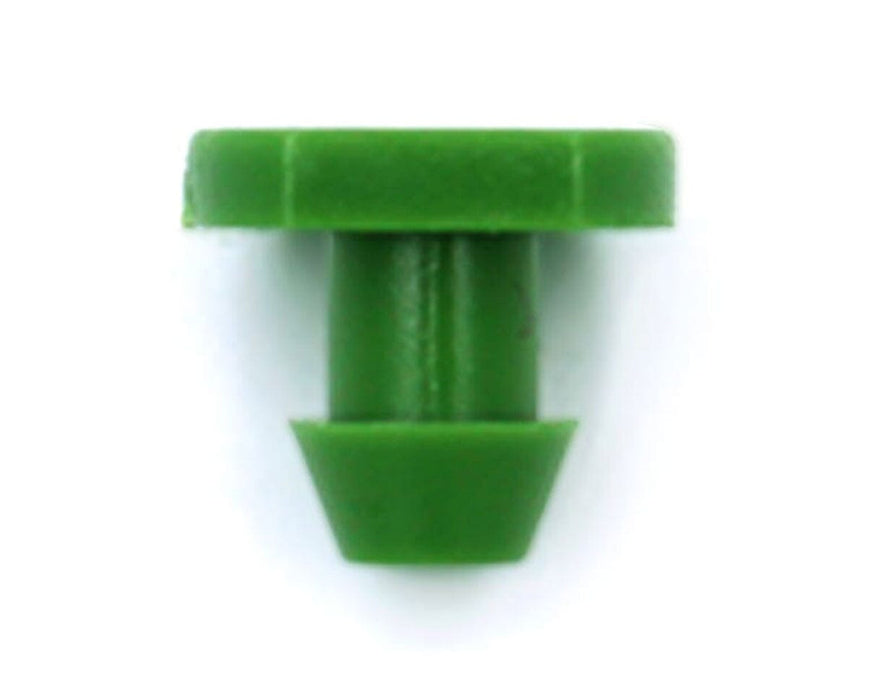 Side profile view of FloraFlex emitter plug showing tapered design for secure drip line fit.