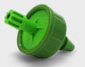 Angled close-up of green FloraFlex micro emitter showing inlet barb and drip outlet.