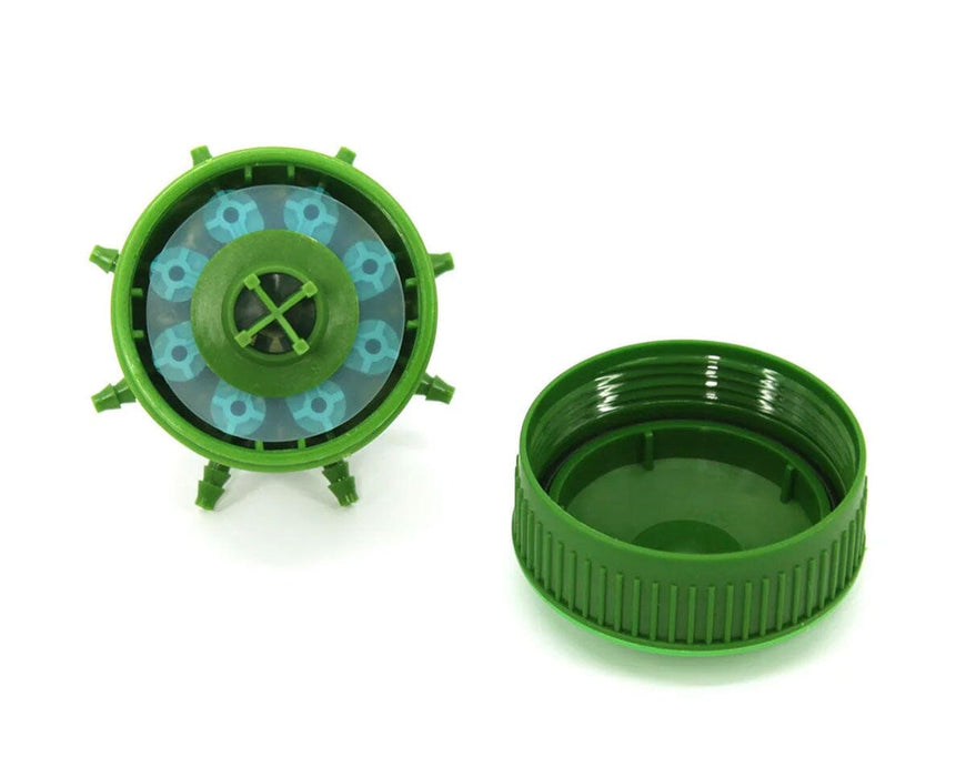 Open top view of FloraFlex Bubbler showing installed blue flow inserts and detached cap.