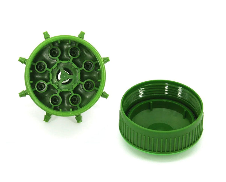 Open top view of FloraFlex Bubbler head with internal connector ports and detached green cap.