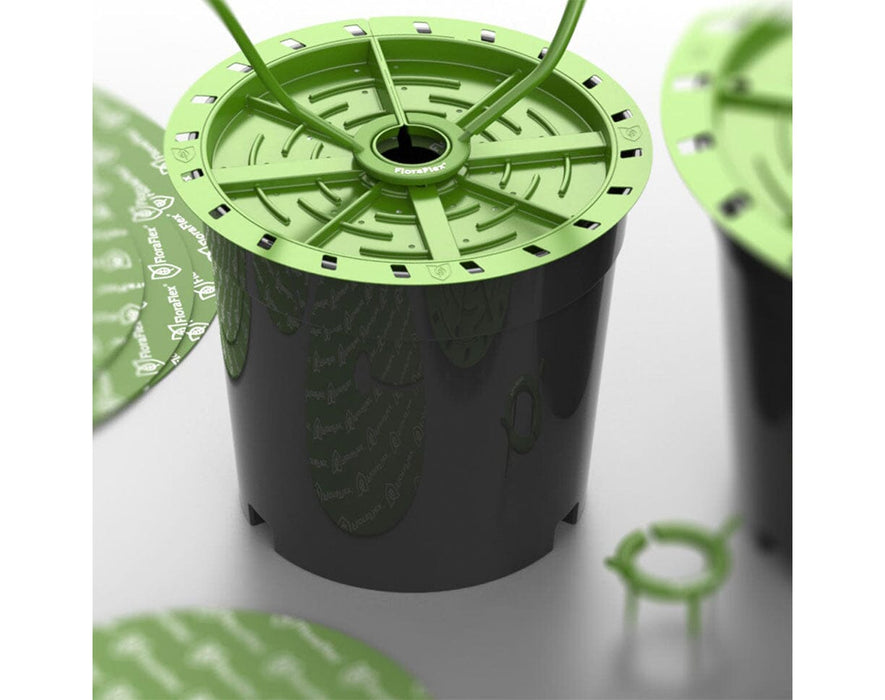 FloraFlex Round Matrix installed on a grow pot with tubing connected, demonstrating complete top feed setup.