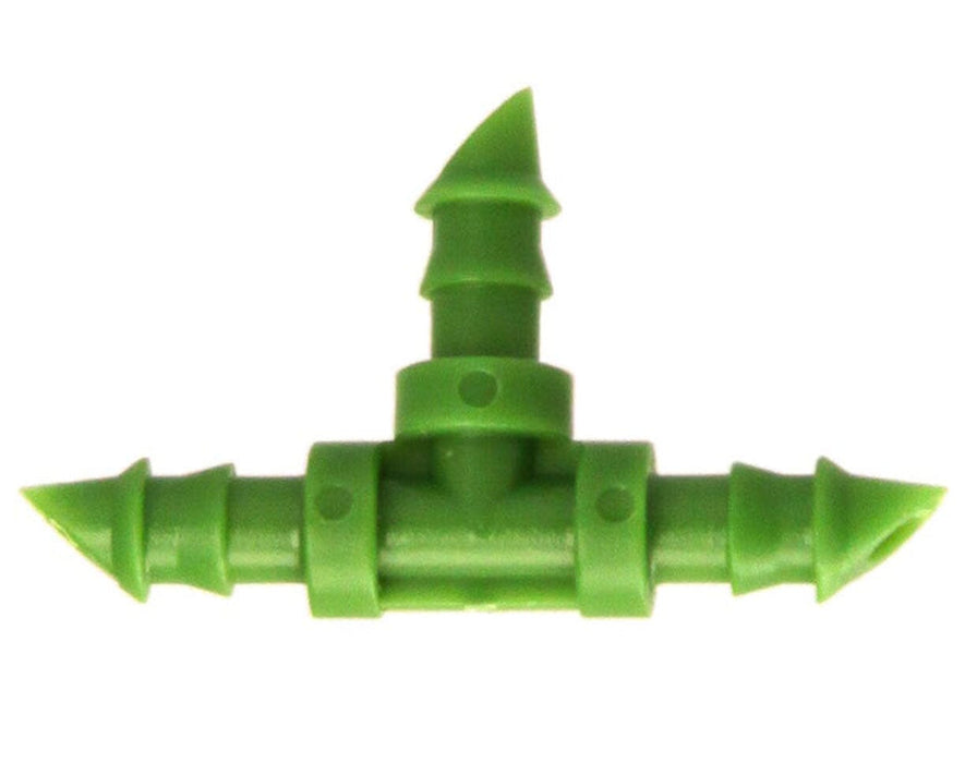 Top-down view of a single FloraFlex barbed tee fitting for 1/4" tubing, featuring leak-resistant barbs and durable design.