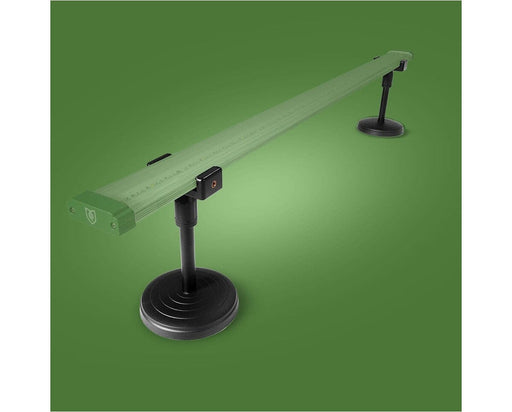 Under-canopy light mounted on two FloraFlex adjustable stands for stable ground-level lighting.
