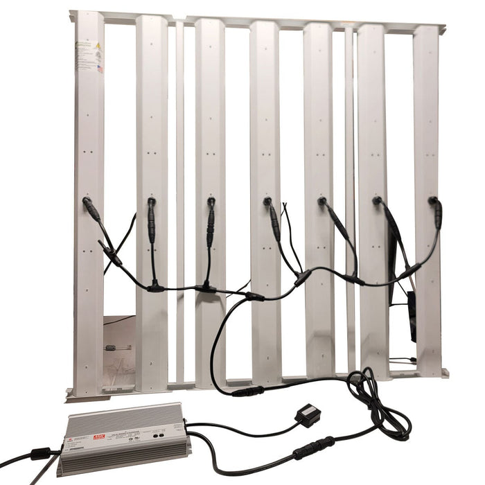 Back view of HLG Genesis X HV LED grow light showing driver connections and daisy-chained wiring between light bars.