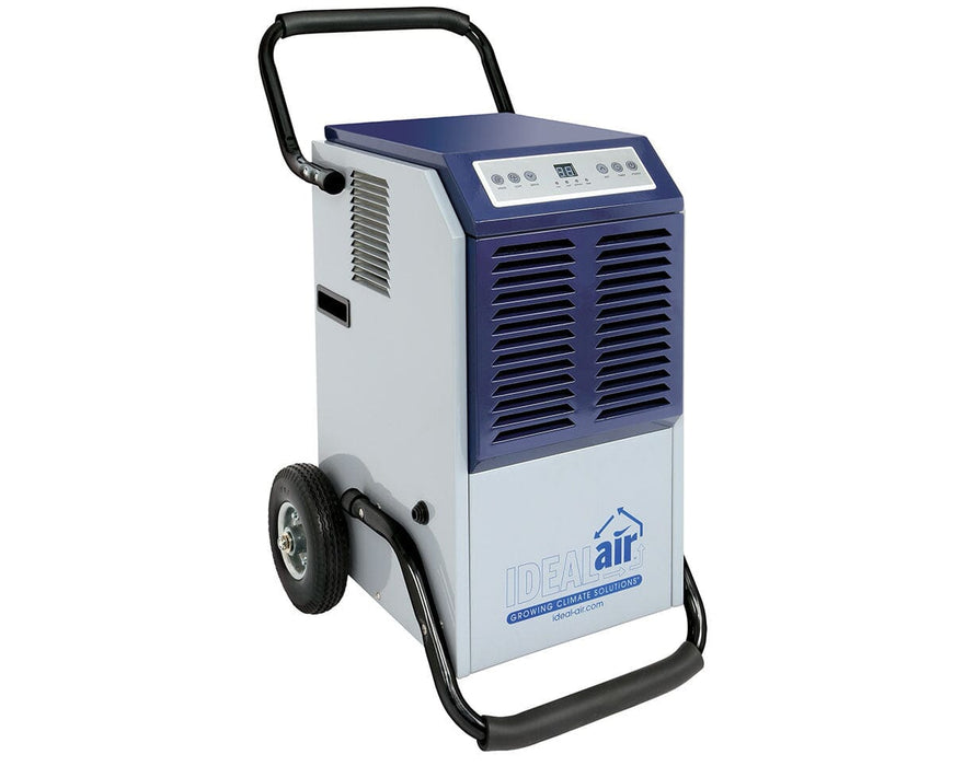 Rear view of the Ideal-Air dehumidifier fully assembled, showing its dark blue louvered panel, sturdy wheels, and branding on the side.