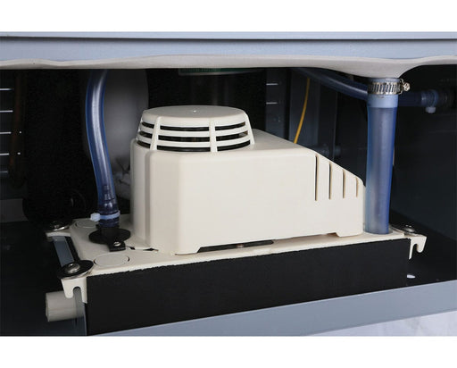 Close-up of the internal pump mechanism inside the dehumidifier, showing connected blue tubing and a white vented housing mounted on a metal bracket.