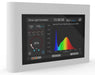 Close-up of LED controller screen with real-time spectral power distribution curve, power usage, and environmental readouts.
