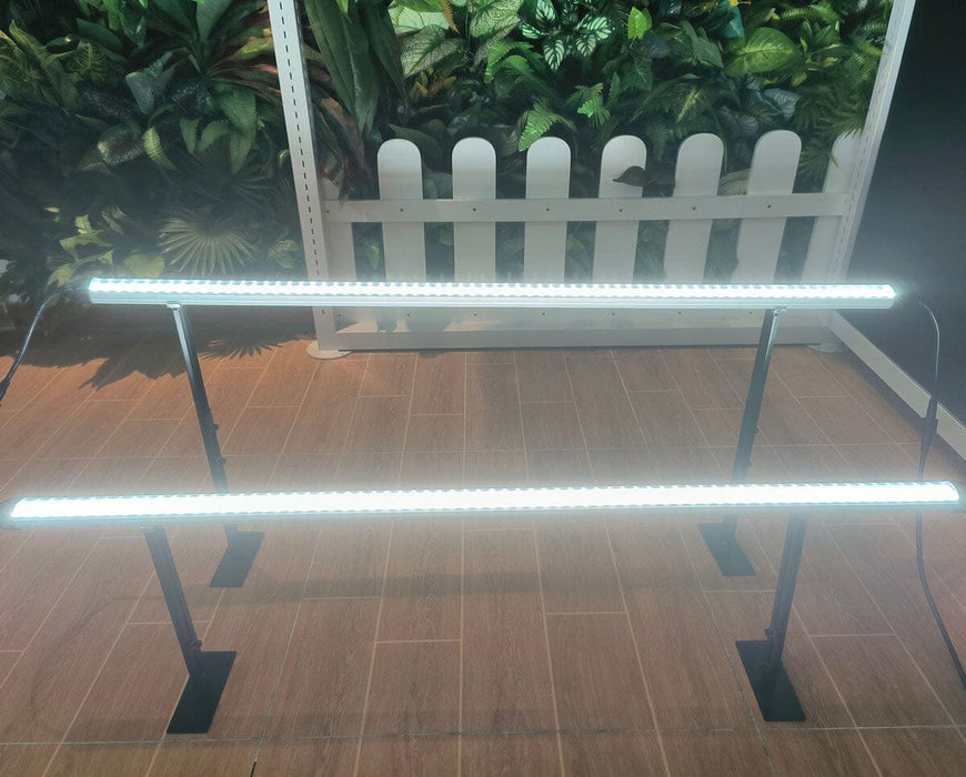 Two Mammoth Clone & Inter-Canopy LED bars fully lit on stand system, ideal for propagation and side lighting.