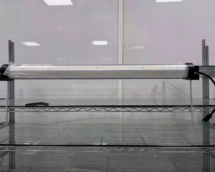 Nova Sun LED grow light bar installed horizontally on wire shelving in a test or grow room environment.