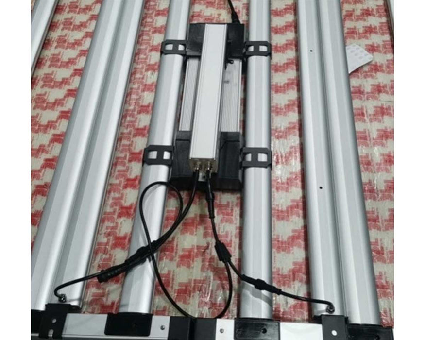 Mammoth UV Upgrade Kit driver connected to two UV bars mounted between LED grow light strips.