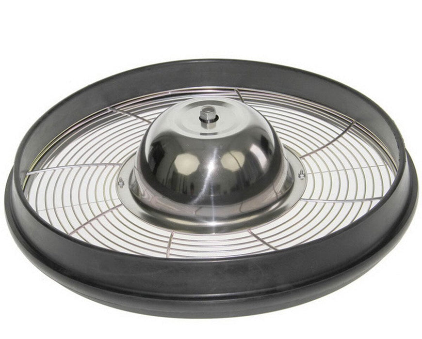 Top-down view of the stainless steel bowl trimmer’s internal cutting grate and rotor system, enclosed by a black rubber ring.