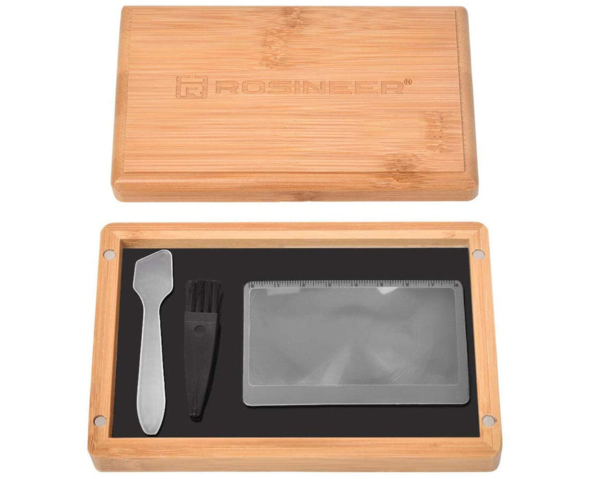 Open Rosineer pollen sifter base box with tools set on black tempered glass catch tray and bamboo lid above.