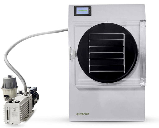 Front view of Stay Fresh Mega Freeze Dryer with clear door, six-tray shelf system, and pump attached.