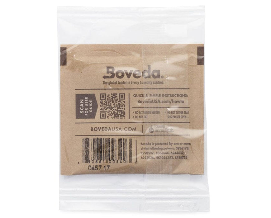 Back of a Boveda 62% RH 8g humidity control pack individually sealed in clear plastic, showing usage instructions, barcode, QR code, and brand details.