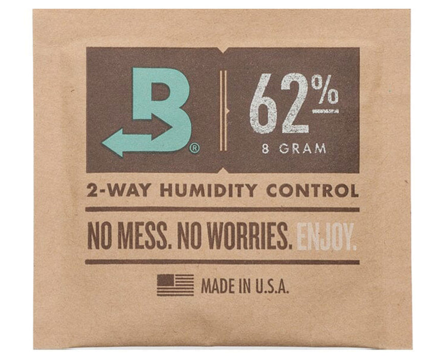 Unwrapped Boveda 62% RH humidity control pack, 8 grams, labeled for 2-way humidity control with "No mess. No worries. Enjoy." printed on kraft paper packaging and Made in U.S.A. badge.