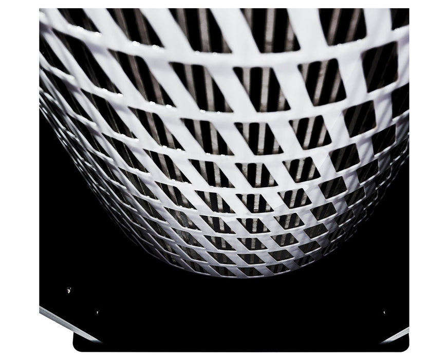 Close-up of the stainless steel perforated drum inside the DBT Model 3, highlighting its trimming surface.