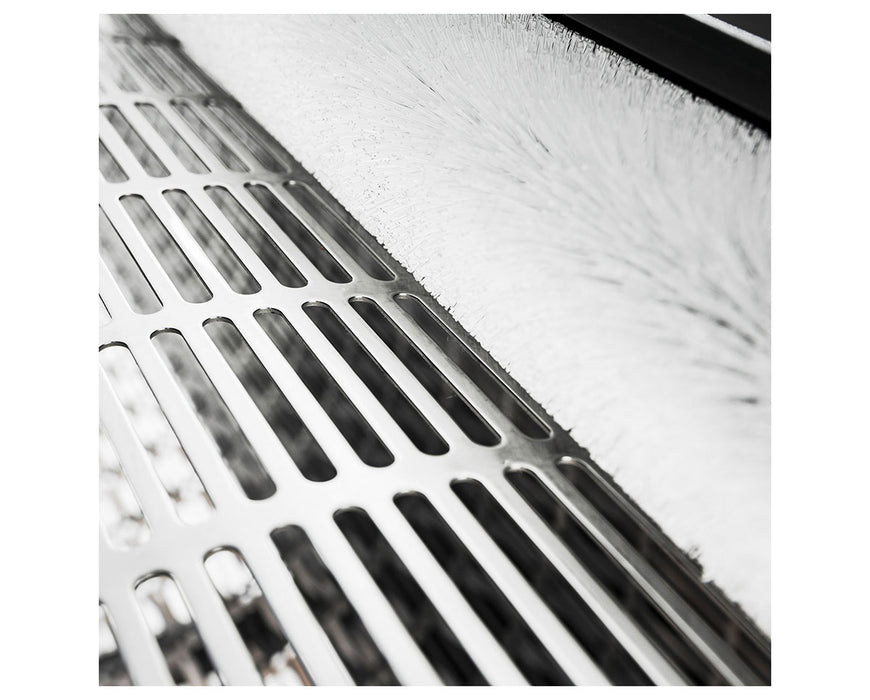 Close-up of stainless steel tumbler slots and brush bar of the CenturionPro DBT Model 5 dry trimmer.